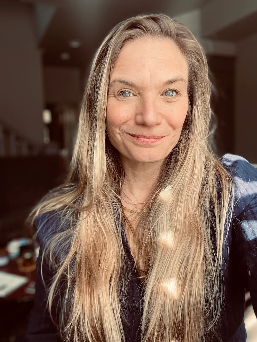 Headshot photo of mathematician, Kate Ertmann. 